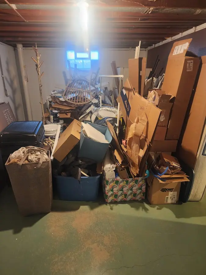 Roll-off dumpster container at job site for Construction Dumpster Rental in Naples Park